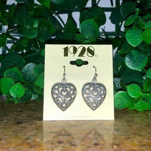 Heart shaped silver colored earrings